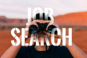 searching for a job with binoculars
